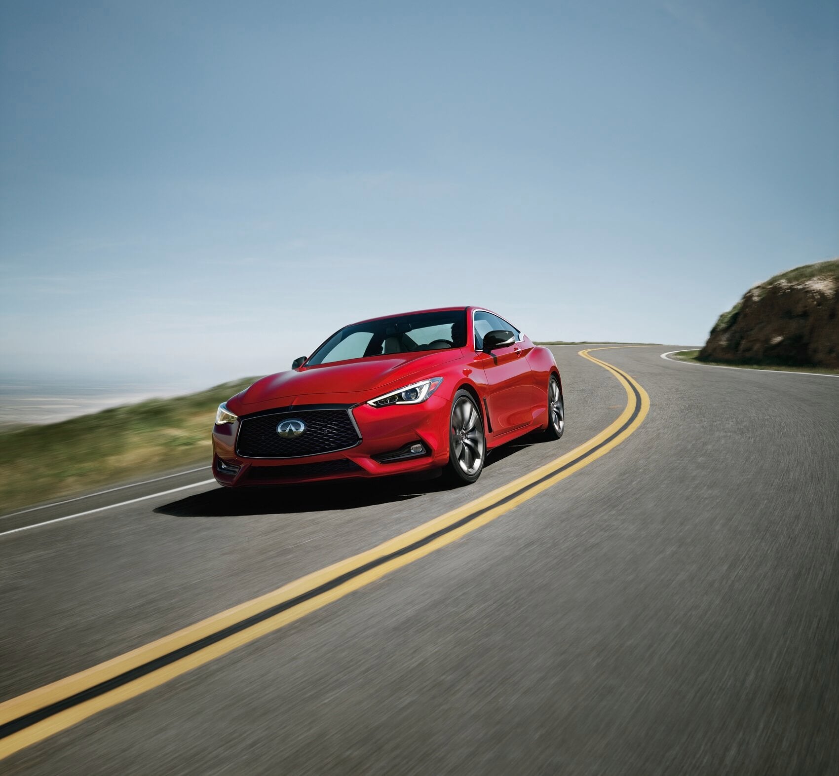 INFINITI Q60 on a winding road