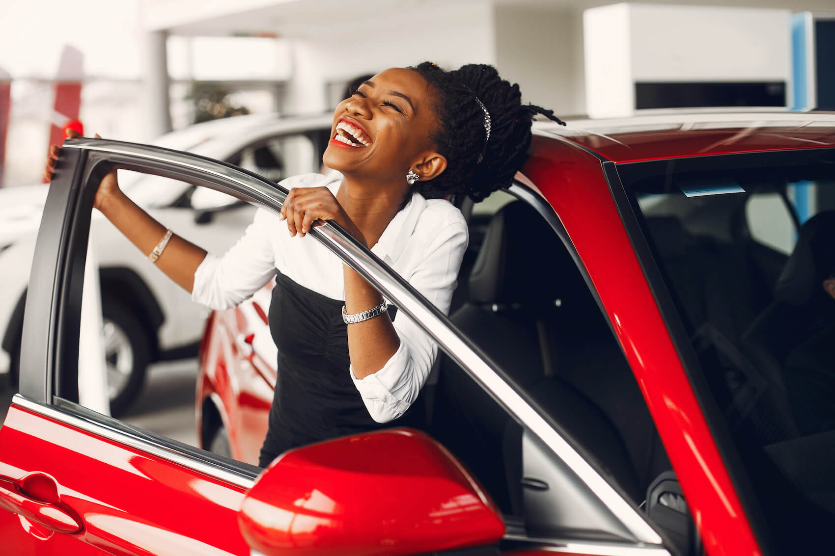Woman smiling from her INFINITI